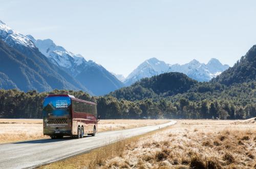 Milford Sound Coach driving towards the Hollyford Valley