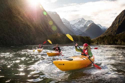 Milford Sound kayakers in beautiful Harrison Cove